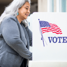 Woman at a voting booth