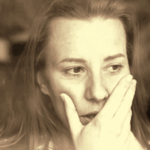 Woman looking out of window