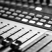 Close up of a mixer desk in a recording studio