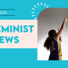 A basketball player in a blue and yellow jersey shoots a basketball. Text on the image reads "In Feminist News" alongside "April 2024."